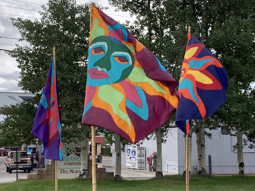 flying color flags in the wind attract visitors